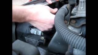 How to change the headlight bulbs on a Peugeot shown on a Peugeot 206 [upl. by Yaner33]