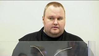 Dotcom behind bars in Internet piracy case [upl. by Sreip]