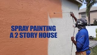 Painting 2 story stucco house  Spray painting [upl. by Benton]