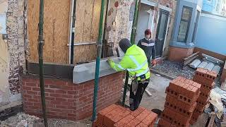 Bricklaying how to install a stone bay [upl. by Yddub]