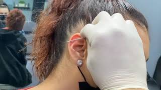 Industrial piercing INSTRUCTIONAL how to pierce properly [upl. by Darlleen]