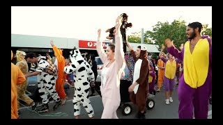 Massive onesie party surprises street festival [upl. by Eidnim]