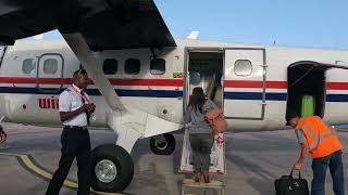 WORLD shortest RUNWAY 2022 Winair Flight St Maarten to Saba Cockpit view Winair DHC6 Twin Otter [upl. by Anaujat661]