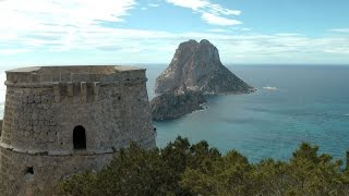 Spain Balearic Island Ibiza  south coast  pirate tower es Savinar amp rock island es Vedra [upl. by Ennasor]