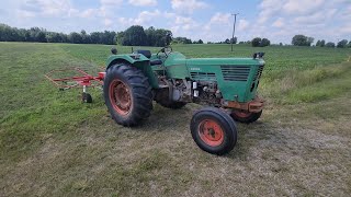 tedding hay feild with deutz D6006 and 2 basket hay tedder [upl. by O'Carroll]