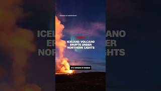 Iceland volcano erupts under northern lights [upl. by Yhtnomit]