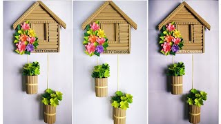 cardboard house 🏡 flower wallhangingpaper flower wallhangingwallmatepaper craftcardboard craft [upl. by Bekah]