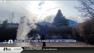 WATCH Boiling water turns to steam with arctic conditions [upl. by Arriaes]