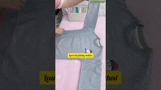 Perfect Sweatshirt Fold in 10 Seconds shorts fashion clothhacks clothstorage laundrytips [upl. by Nosemyaj]