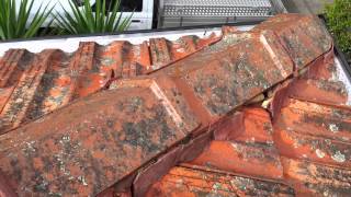 A cheap house gutter job on a tile roof [upl. by Ahsets62]