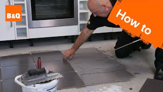 How to tile a floor part 2 laying the tiles [upl. by Castora965]