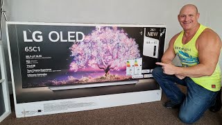 2021 65quot LG C1 OLED Unboxingwall mounting amp demo [upl. by Curren]