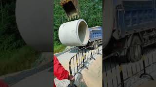 How to unloading concrete sewer pipe with excavator [upl. by Stag49]