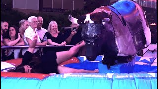 Spanish Resort Rodeo😮 DressedUp Girl Riding on a Bull in Benidorm  Mechanical Bull 4K EPIC FAIL [upl. by Uda528]