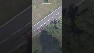 Drone footage shows Russian UAV target Ukranian tank near border [upl. by Edivad]