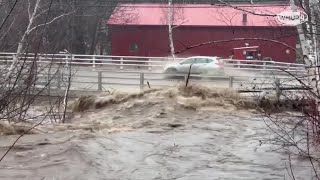 Water rages over bridge in Gorham New Hampshire [upl. by Prosper]