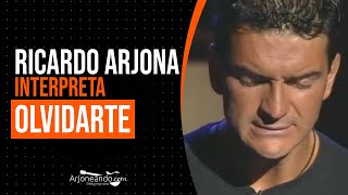 Ricardo Arjona  quotOlvidartequot en vivo [upl. by Ahsiad144]