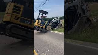 Mini Excavator Nearly Flips Over While Pulling Skid Steer up  1434391 [upl. by Demakis]