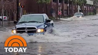 Torrential downpours bring flooding to East Coast [upl. by Sitoel]