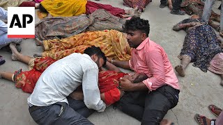 More than 100 dead in stampede at religious gathering in northern India officials say [upl. by Paz]