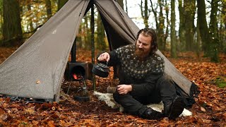 Bushcraft trip  rainy day in a hot tent next to large lake making firewood and cooking a meal etc [upl. by Atinaej]