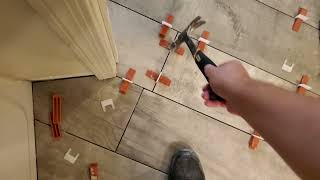 Removing Raimondi Tile Leveling System With a Hammer [upl. by Eramal141]