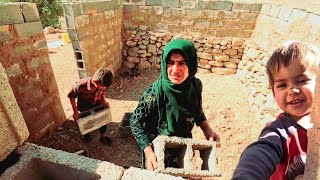 quotA single mother and three young children building a stone house in the territory of the nomadsquot [upl. by Chaille642]