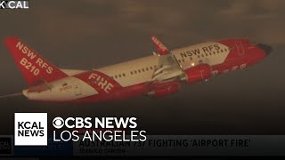 Firefighting plane on loan from Australia seen dropping water on Airport Fire in Orange County [upl. by Goldy]