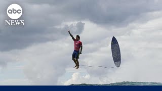 Viral photo of Olympic surfer’s midair celebration [upl. by Acissehc]