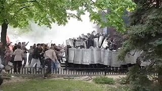 Ukraine riot police forced to flee as proRussian separatists storm Donetsk prosecutors office [upl. by Dranyar]