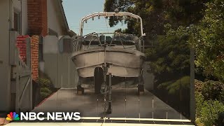 Man has a mural painted of his boat hidden behind a fence on his driveway [upl. by Sage]