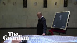 Vladimir Putin lays flowers next to open coffin of Mikhail Gorbachev [upl. by Bathsheeb]