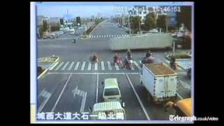 Cyclists amazing escape as speeding truck overturns at cross roads [upl. by Ennaegroeg]