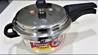 Prestige Deluxe Alpha Stainless Steel Pressure Cooker 4 Litres Review and Demo [upl. by Ynnob280]