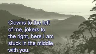 Stealers Wheel  Stuck In The Middle With You LYRICS [upl. by Llenrahs]