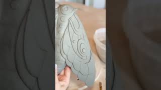 Artist is making a moth out of pottery clay [upl. by Ahseiyk152]