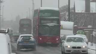 Buses in the snow in Enfield North London on 20th Jan 2013 [upl. by Aneger]