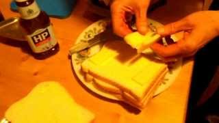 Cooking off grid on a wood burning stove cheese toasty [upl. by Dnalyk]