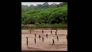 Watch Rare Sighting of Uncontacted Mashco Piro Tribe Emerging from Amazon Jungle in Peru [upl. by Leelahk]