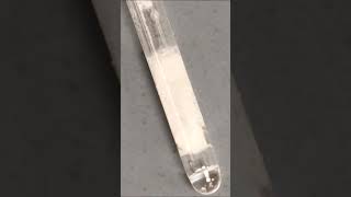 Acetanilide crystallizing in a melting point capillary tube chemistry crystal stem macrovideo [upl. by Kissner]