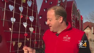 Gov Jared Polis Takes Part In Loveland Valentines Stamping Program [upl. by Aisylla]