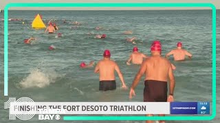 Hundreds of athletes get up early to participate in the Fort De Soto Triathlon [upl. by Haidabo]