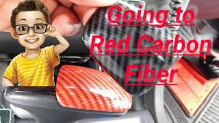 Installing the red Carbon fiber shift knob cover [upl. by Aramen]