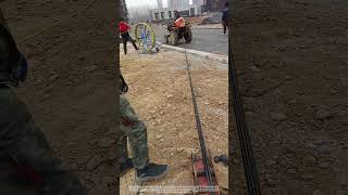 Use A Tractor To Pull Pipe Cables Through A Manhole [upl. by Enilesor]