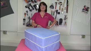 How To Slipcover An Ottoman Part 1 Measuring For Fabric [upl. by Oninrutas]