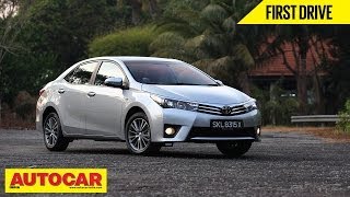 2014 Toyota Corolla Altis  Exclusive First Drive Video Review  Autocar India [upl. by Ysiad844]