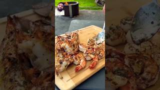 Grilled garlic shrimp 🦐🍤 seafood garlicbuttershrimp food grilledlobster garlicshrimp [upl. by Ignatzia110]