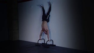 Kipping Deficit Handstand Push Up by Wodstar [upl. by Cirala674]