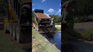 Nothing beats some brown pea gravel 🤩  🎥 southernsunpaving9979 asphaltpavement construction [upl. by Lika445]