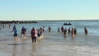 Thousands hit the beach for Coney Island Polar Bear plunge [upl. by Abixah329]